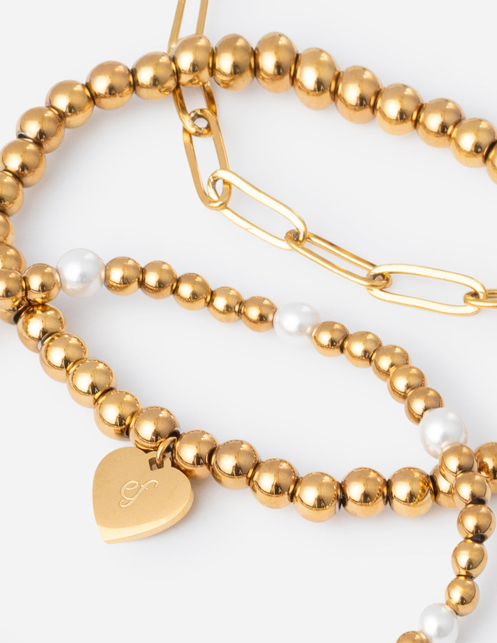 Elegant Elevated Faith Christian Jewelry Bracelet featuring gold and pearl beads with a heart charm