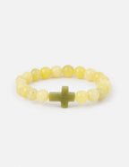 Elevated Faith Christian Jewelry Bracelet featuring yellow stones and a green cross charm