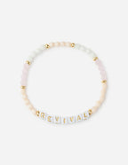 Elevated Faith Christian Jewelry Bracelet with pastel beads and white letter beads spelling REVIVAL