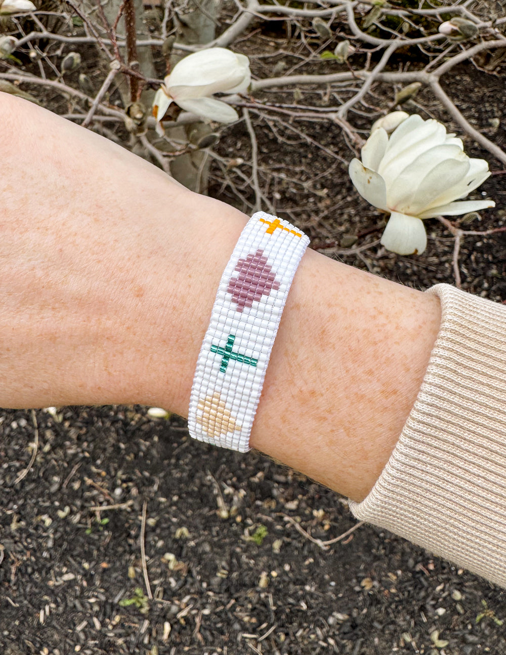Elevated Faith Christian Jewelry Bracelet with colorful beads on a white string for a stylish look