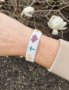Elevated Faith Christian Jewelry Bracelet with colorful beads on a white string for a stylish look