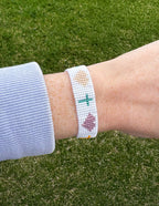 Colorful Elevated Faith Christian Jewelry Bracelet with a unique design on a wrist