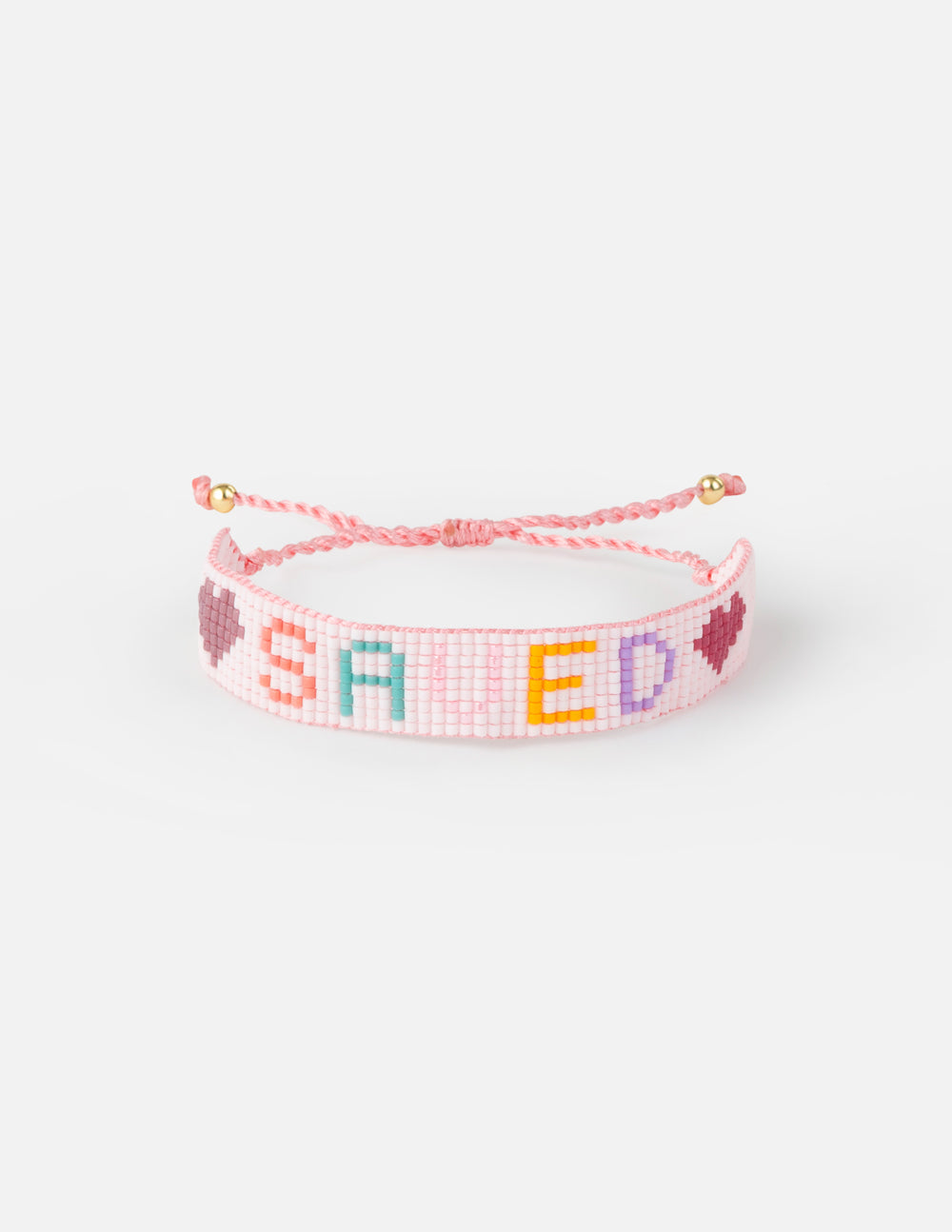 Pink Beaded Christian Jewelry Bracelet with 'SAVED' and heart designs for faith-inspired style