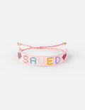 Pink Beaded Christian Jewelry Bracelet with 'SAVED' and heart designs for faith-inspired style