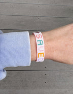 Elevated Faith Christian Jewelry Bracelet with colorful letter beads spelling 'SPARED'