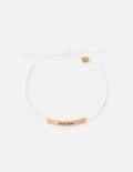 Elevated Faith Christian Jewelry Bracelet with a 'Seek Him' engraved bar and adjustable string design