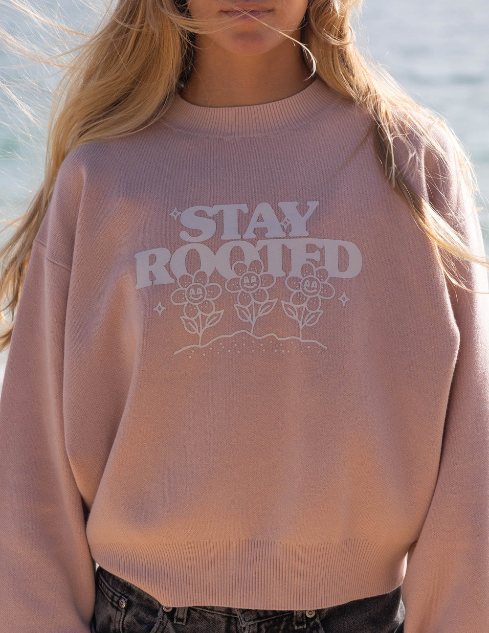 Elevated Faith Christian Crewneck Sweatshirt in light pink with 'Stay Rooted' floral design