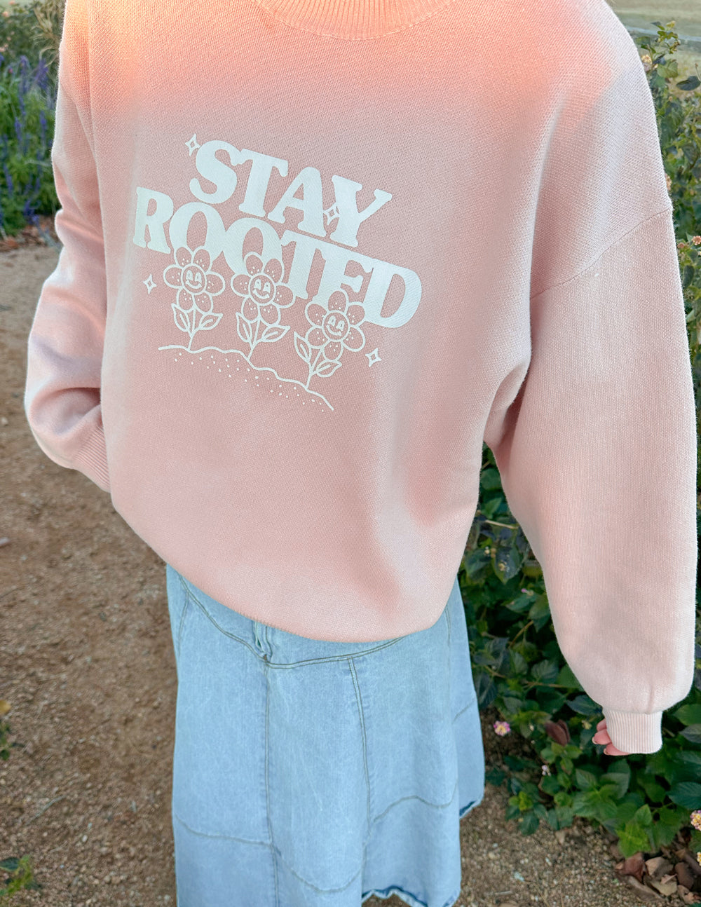 Pink Christian Crewneck Sweatshirt featuring a floral design and 'Stay Rooted' text