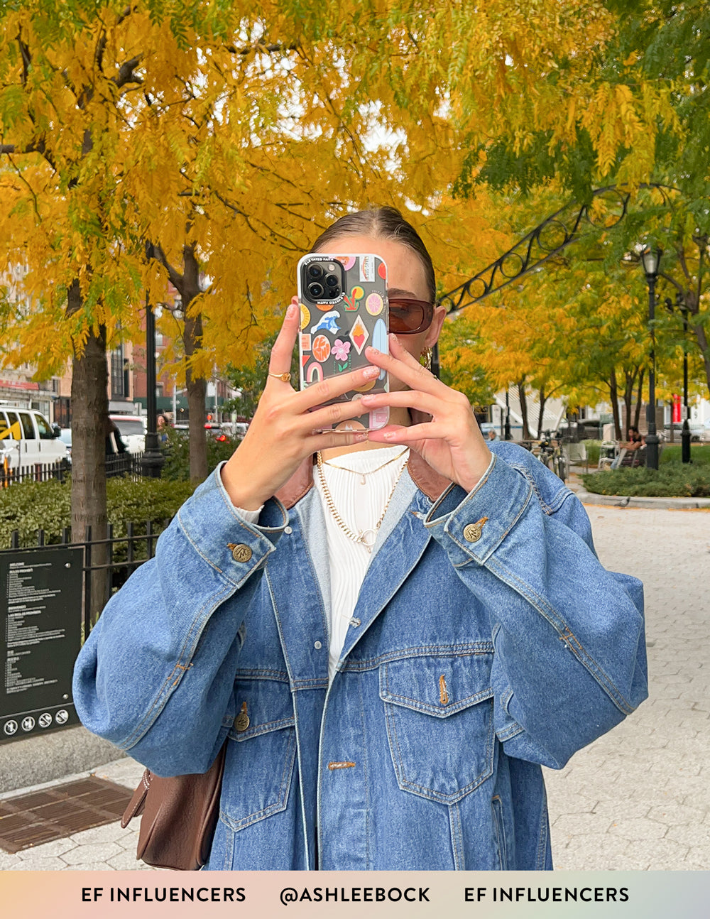 Elevated Faith Christian iPhone Case with Colorful Design and Floral Accents in Outdoor Setting