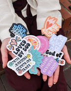Variety of Elevated Faith Christian Stickers featuring uplifting messages and vibrant designs