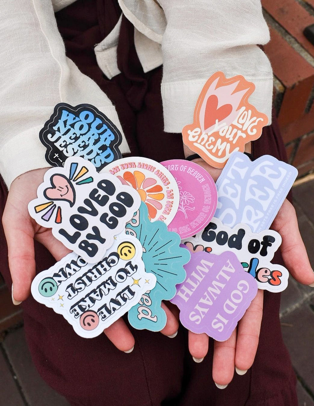 Variety of Elevated Faith Christian Stickers featuring uplifting messages and vibrant designs