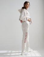 Elevated Faith Sweatpants in Light Beige with 'Strength' Text, Perfect for Christian Apparel