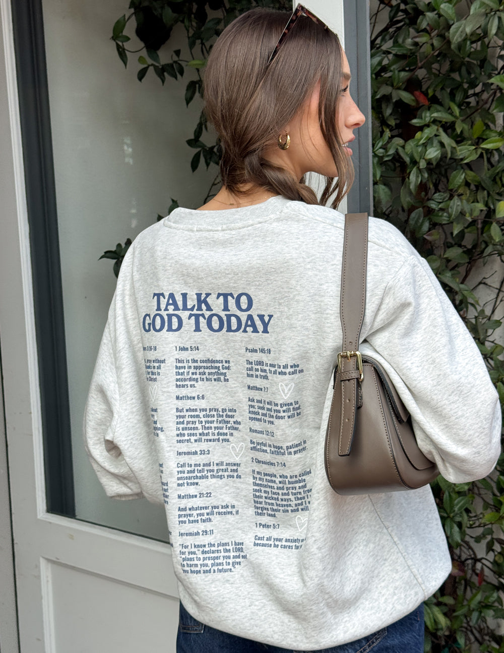 Elevated Faith Christian Crewneck Sweatshirt with inspirational text on the back for daily motivation