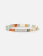 Elevated Faith Christian Jewelry Bracelet featuring colorful beads and the word TRUST in silver