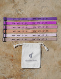 Set of Elevated Faith Christian Jewelry Bracelet wristbands in various colors with a drawstring pouch