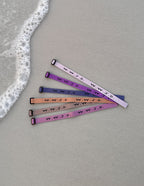 Elevated Faith Christian Jewelry Bracelet set in pastel colors featuring 'W.W.J.D.' message for inspiration