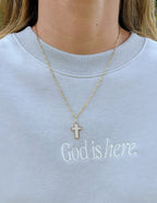 Gold chain necklace featuring a cross pendant, a perfect piece of Christian Jewelry