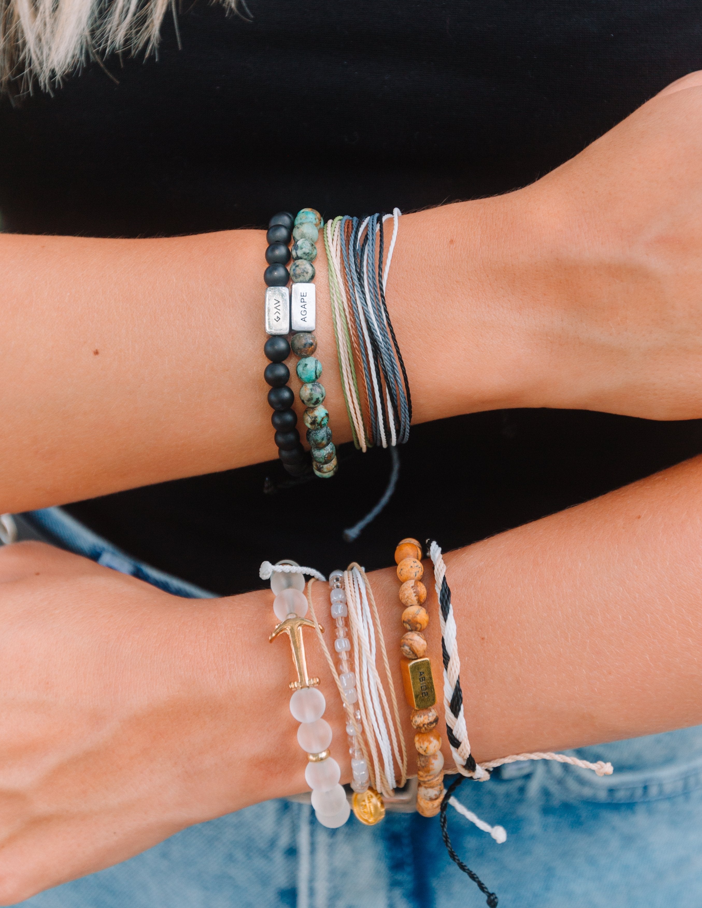 Stylish string bracelet collection showcasing Elevated Faith's Christian Jewelry Bracelet for everyday wear