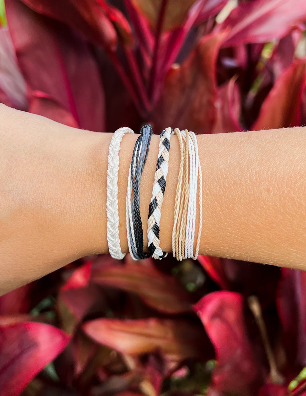 Elevated Faith Christian Jewelry Bracelet featuring multiple braided strings in neutral colors
