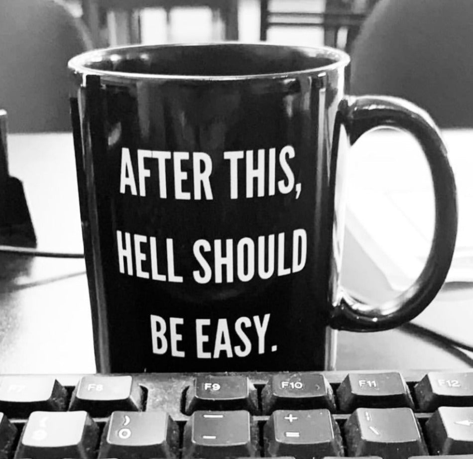 Funny "After This Hell Should Be Easy" — Black mug with white quote “After this, hell should be easy,” metal rim and right handle.