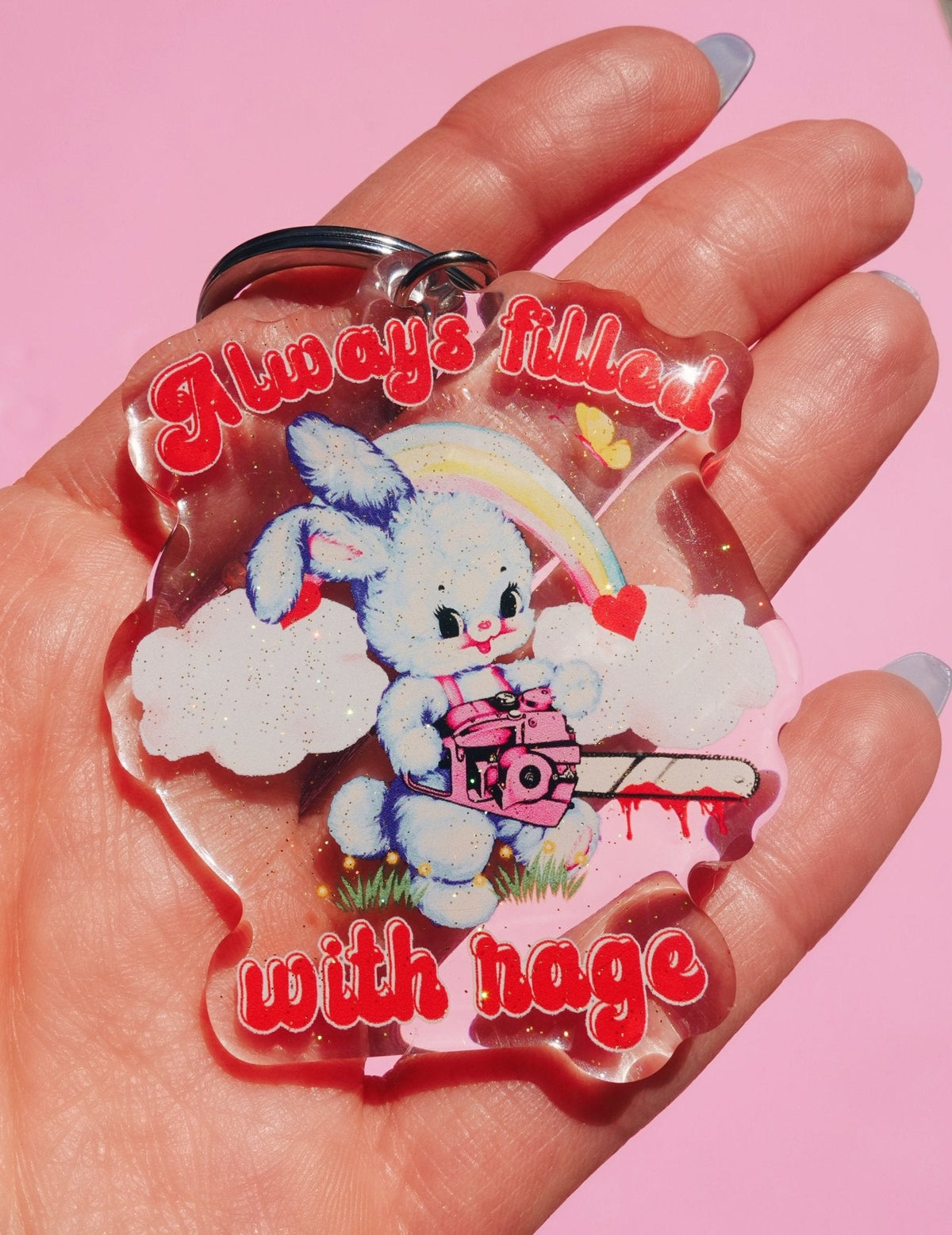 Funny Clear acrylic keychain featuring rabbit with rainbow, clouds, and heart accents in red