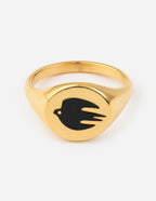Gold ring featuring a black dove design, perfect for Christian Jewelry enthusiasts