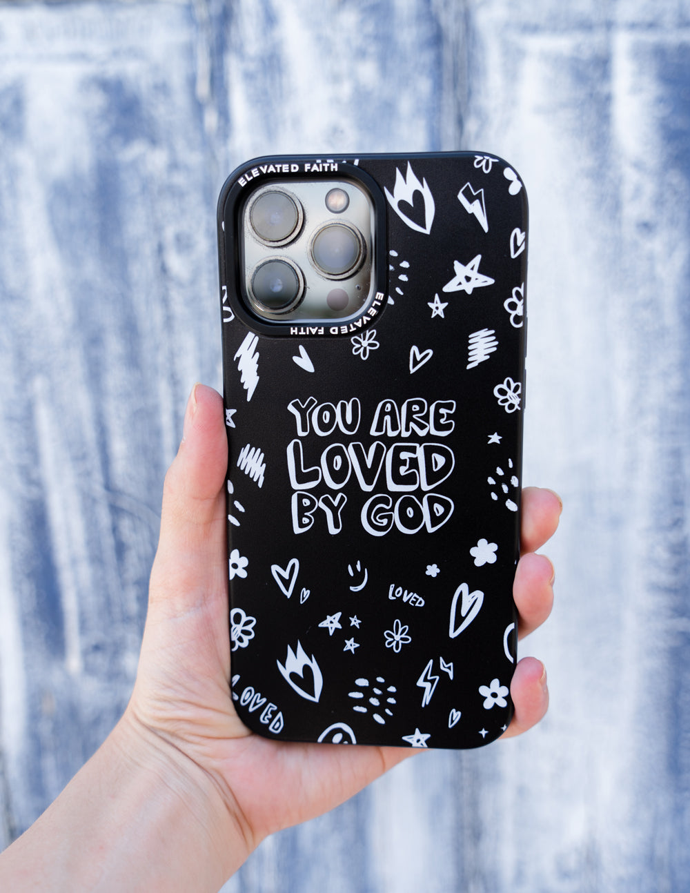 Elevated Faith Christian iPhone Case featuring the phrase You Are Loved by God with doodle designs
