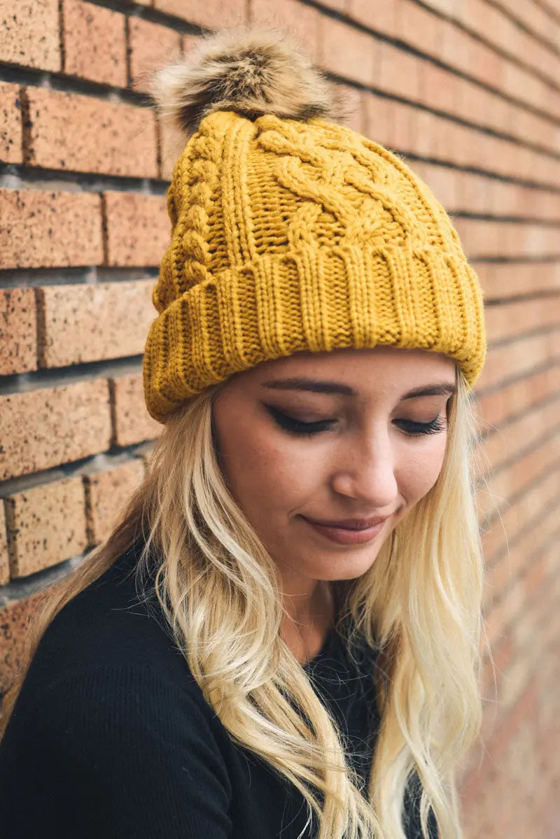 Cable Knit Beanie with Faux Fur Pom knit winter hat in Mustard