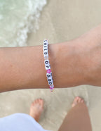Elevated Faith Christian Jewelry Bracelet featuring colorful beads that spell Child of God