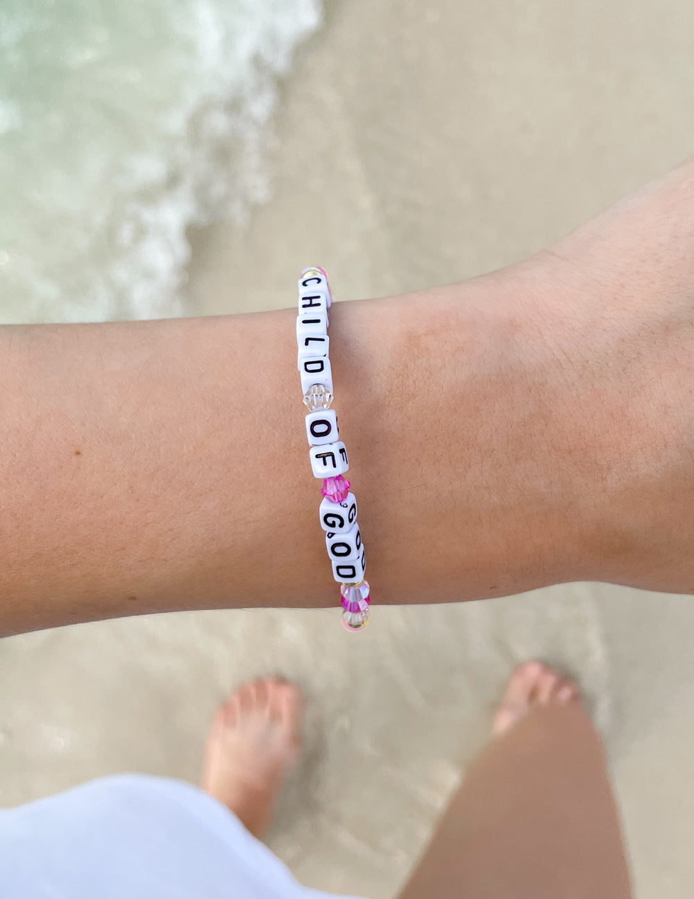 Elevated Faith Christian Jewelry Bracelet featuring colorful beads that spell Child of God