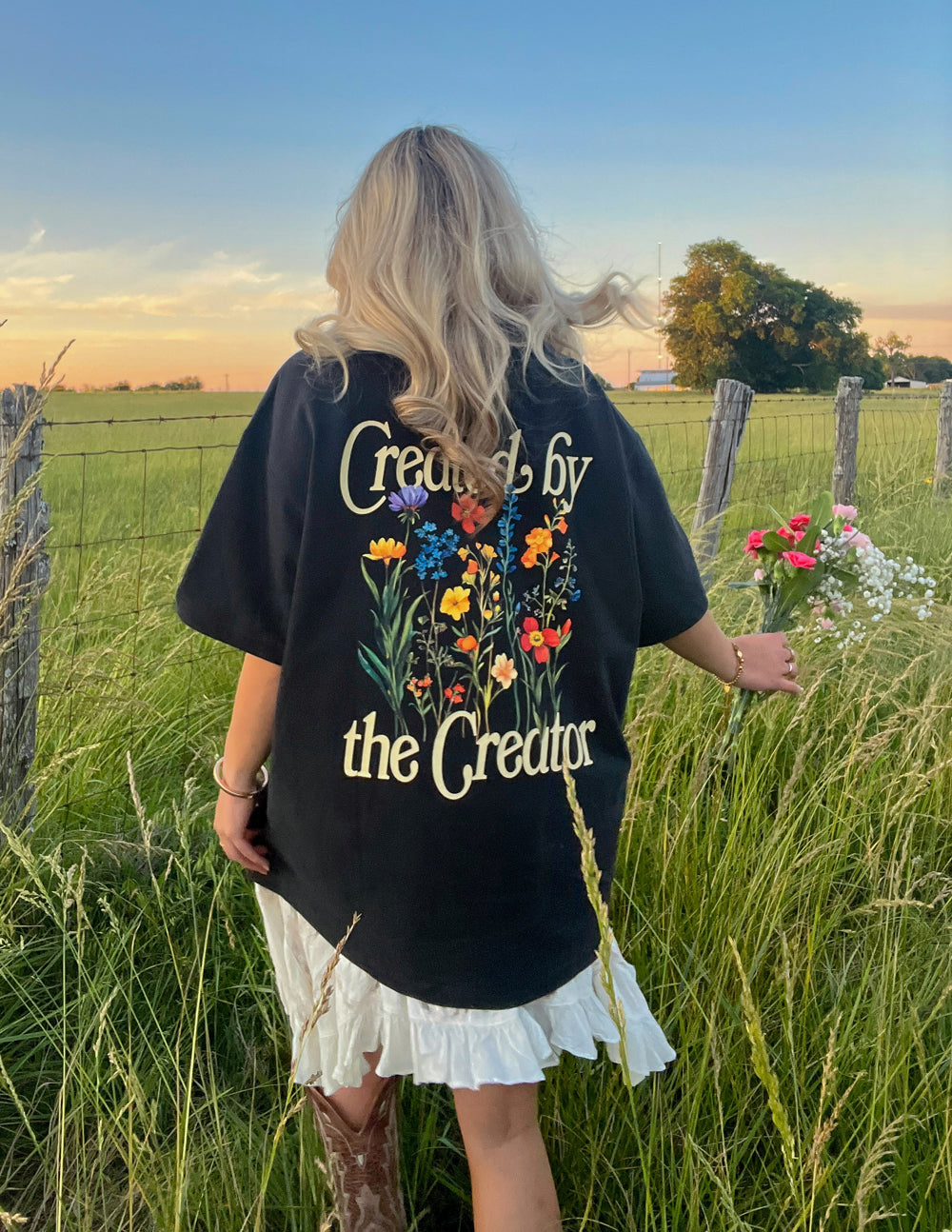 Black Elevated Faith Christian Apparel T-Shirt featuring floral design and text 'Created by the Creator'