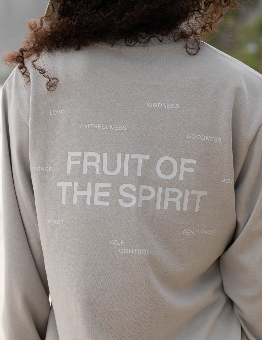 Elevated Faith Christian Apparel T-Shirt featuring 'Fruit of the Spirit' text design on a neutral background