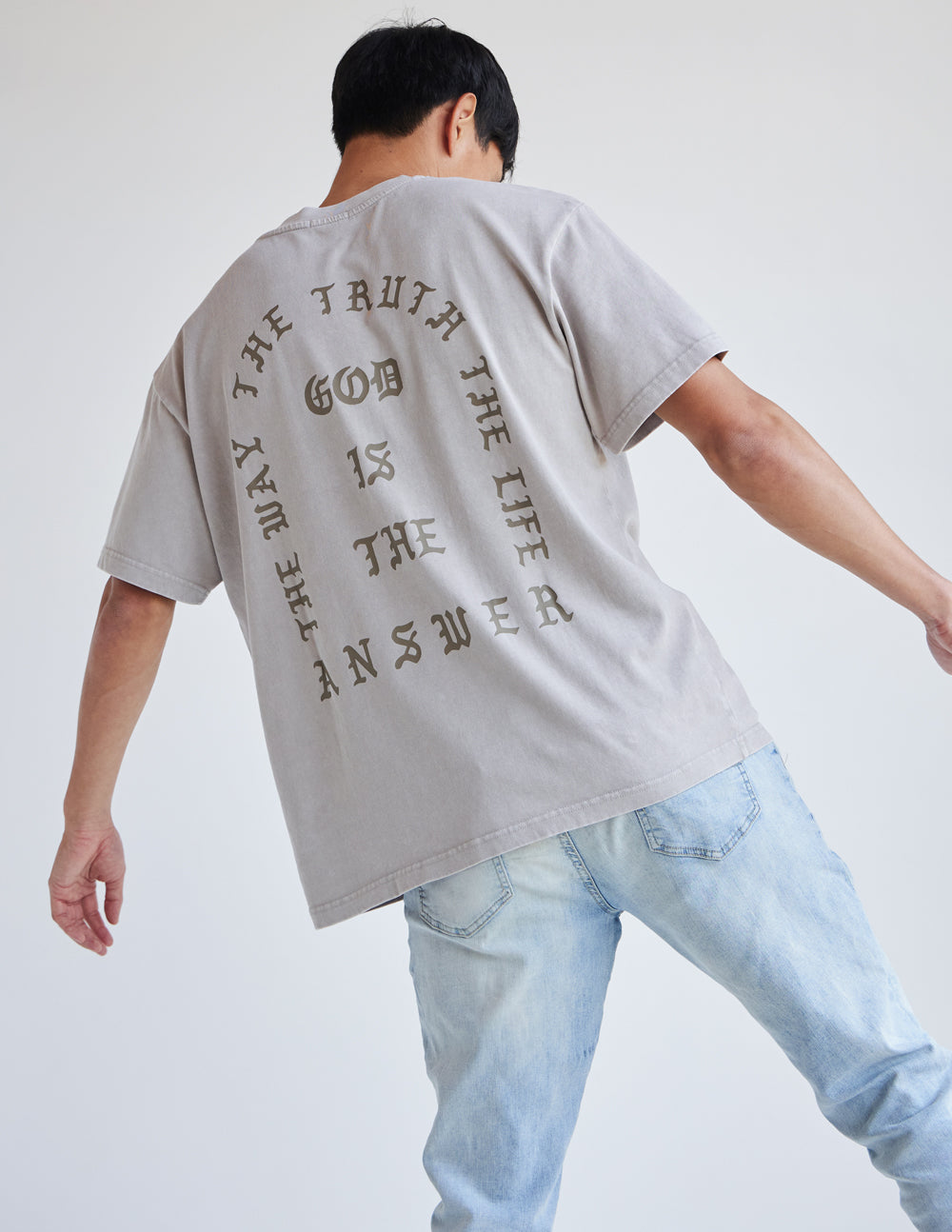 Elevated Faith Christian Apparel T-Shirt featuring a verse design on the back in a neutral color