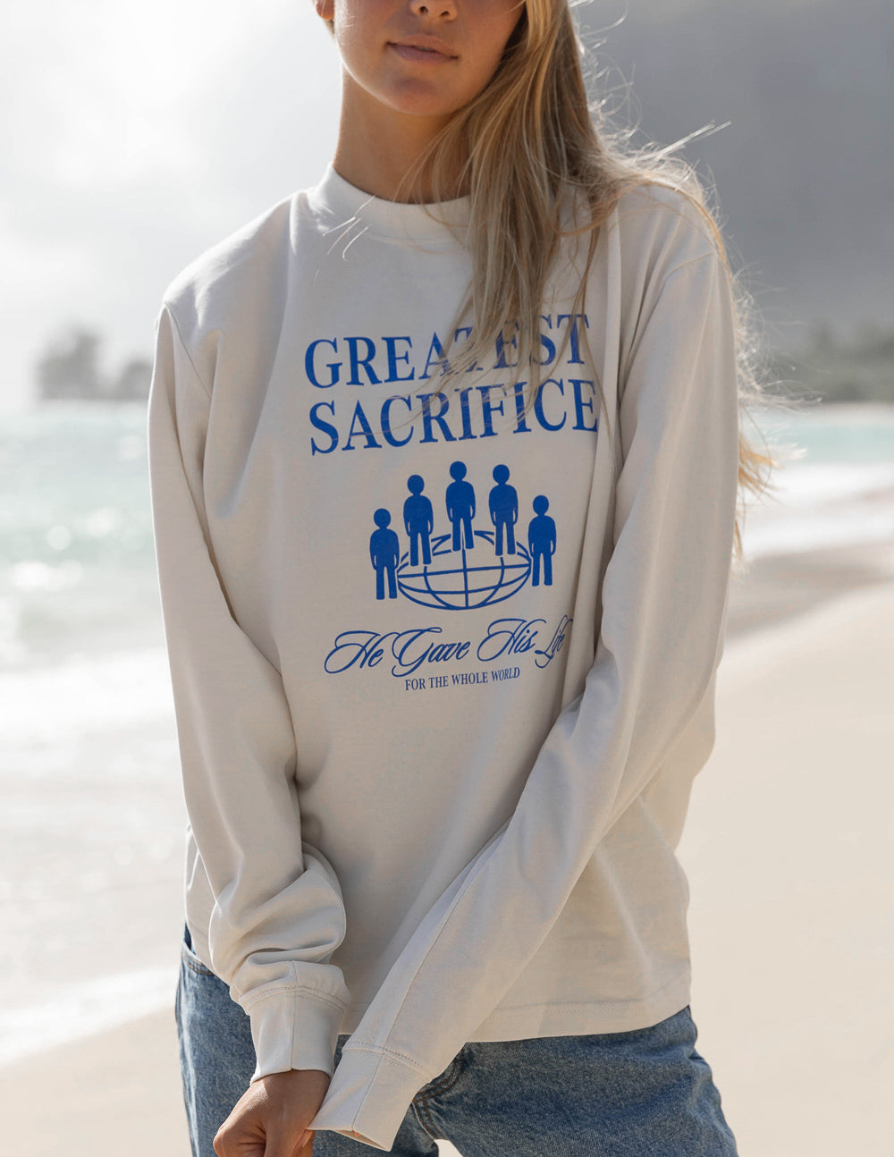 Elevated Faith Christian Apparel T-Shirt featuring a design about greatest sacrifice in blue on a light background