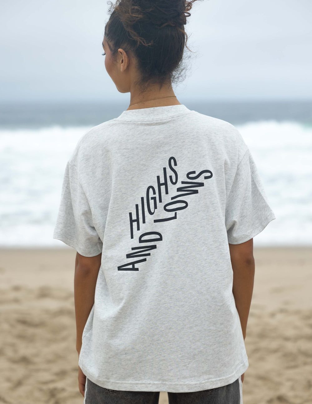 Elevated Faith Christian Apparel T-Shirt with 'Highs and Lows' graphic on back for casual wear