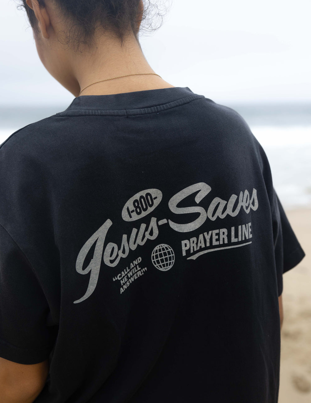 Elevated Faith Christian Apparel T-Shirt featuring a Prayer Line graphic on the back