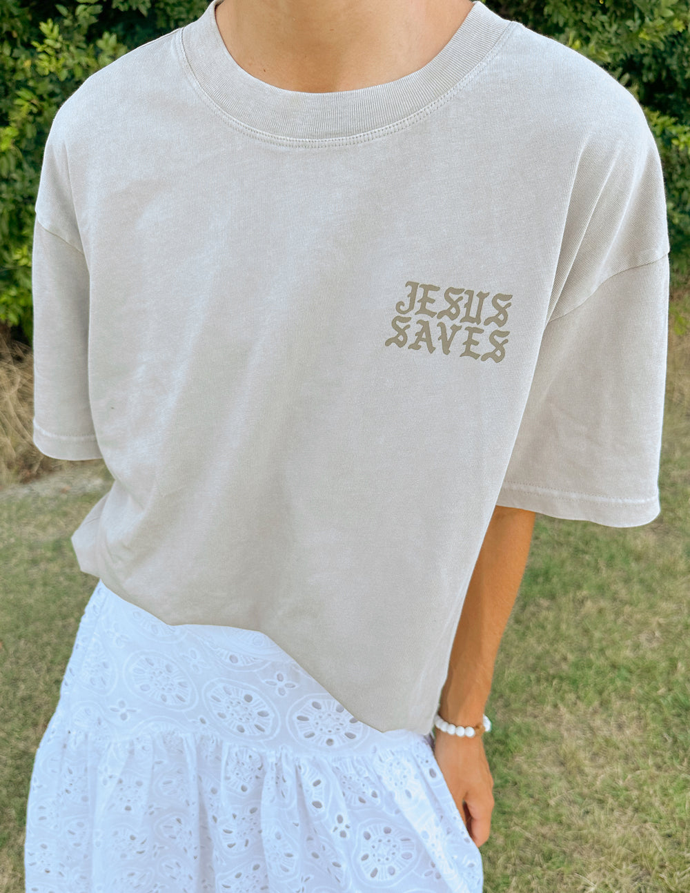 Elevated Faith Christian Apparel T-Shirt in light gray with 'Jesus Saves' design on the front