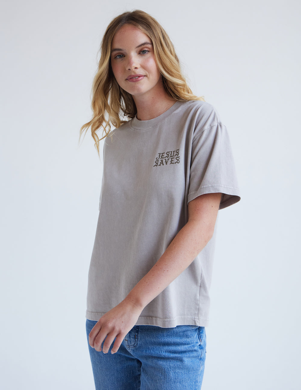 Elevated Faith Christian Apparel T-Shirt with 'Jesus Saves' text design in light gray color