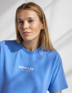 Elevated Faith Christian Apparel T-Shirt in Blue with 'Miracles' printed design for a stylish faith statement
