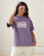 Elevated Faith Christian Apparel T-Shirt in Purple featuring 'Prayer Works' design for casual wear