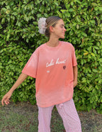 Elevated Faith Christian Apparel T-Shirt in soft pink with 'take heart' design and a heart symbol