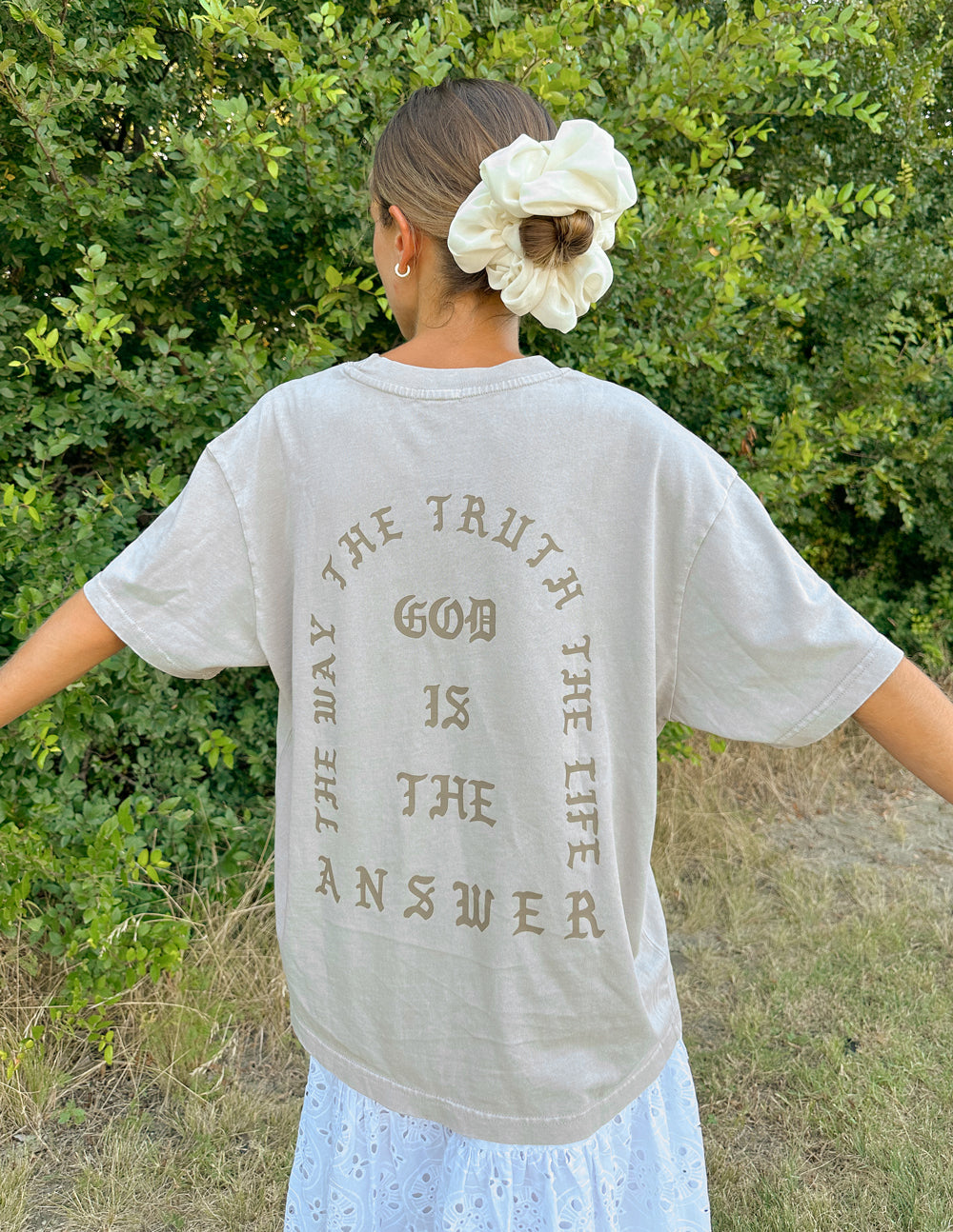 Elevated Faith Christian Apparel T-Shirt with inspirational message on back in a soft grey color