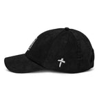 Black corduroy cap from RepThe1 Apparel featuring a white cross, perfect for casual wear and showcasing Christian Jewelry.