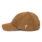 Brown corduroy cap with embroidered cross detail, perfect for showcasing faith through Christian Jewelry
