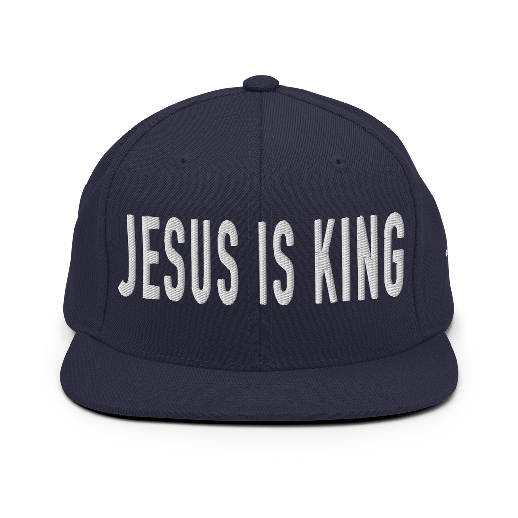 Christian Embroidered Hat with Jesus is King design in bold letters on a navy cap