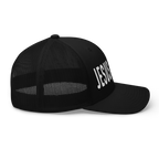 Black Christian Hat with 'JESUS' printed in bold white letters on the front panel