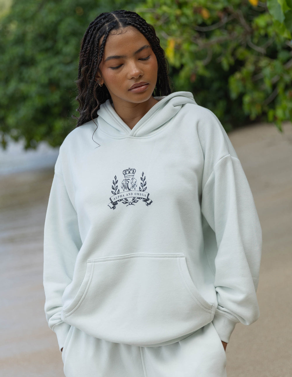 Light gray Christian Hoodie from Elevated Faith featuring a stylish crown logo on the front