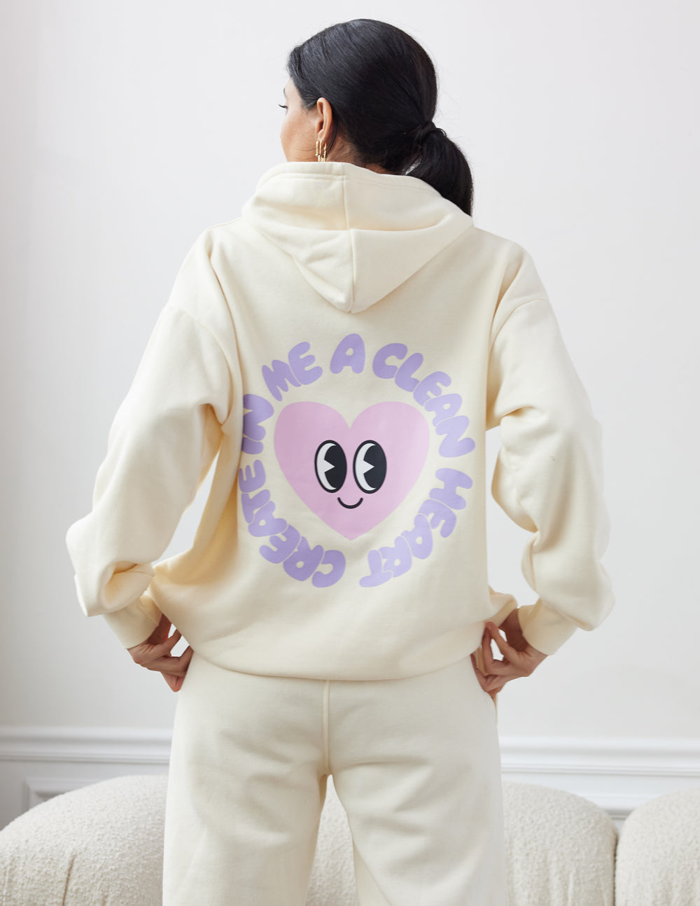 Elevated Faith Christian Hoodie in Cream with Heart Graphic and Motivational Text on Back
