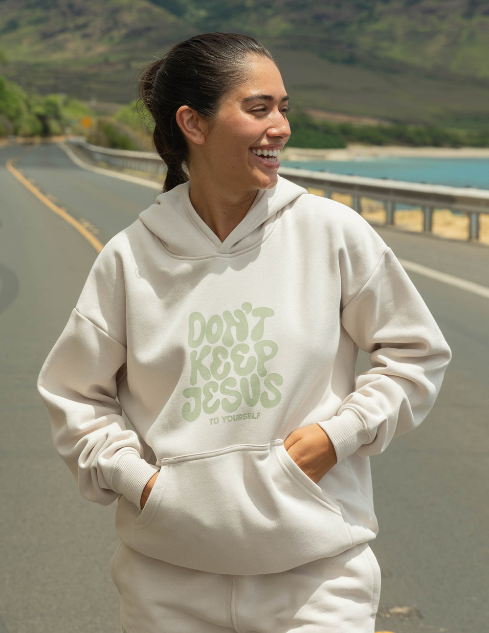 Elevated Faith Christian Hoodie in beige with 'Don't Keep Jesus to Yourself' design for casual wear