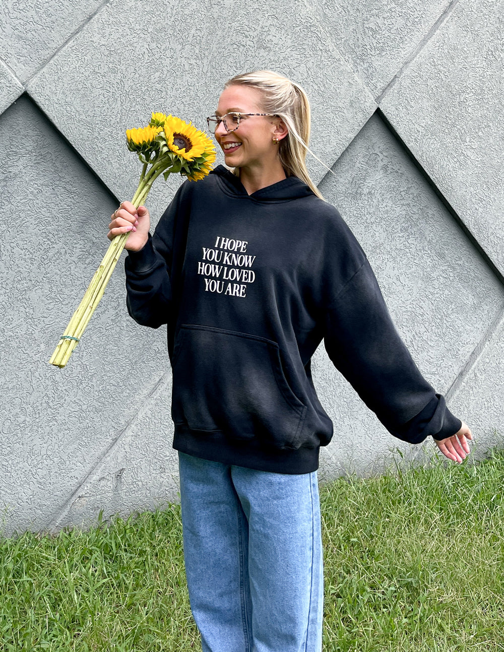 Elevated Faith Christian Hoodie in black featuring 'I Hope You Know How Loved You Are' graphic